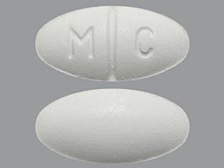 This is a Tablet imprinted with M C on the front, nothing on the back.