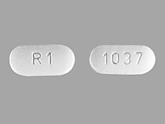 Esto es un Tableta imprimido con R 1 en la parte delantera, 1037 en la parte posterior, y es fabricado por None.