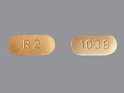 Risperidone: This is a Tablet imprinted with R2 on the front, 1038 on the back.
