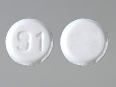 This is a white round Tablet imprinted with 91 on the front, nothing on the back, and is manufactured by TORRENT PHARMAC.