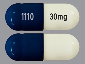 Esto es un Cápsula Dr imprimido con 30mg en la parte delantera, 1110 en la parte posterior, y es fabricado por None.