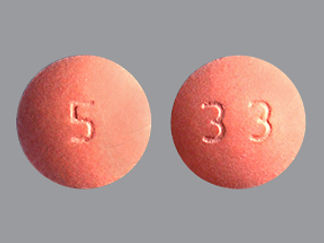 Esto es un Tableta Er 24 Hr imprimido con 33 en la parte delantera, 5 en la parte posterior, y es fabricado por None.