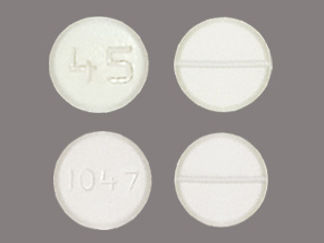 This is a Tablet Dose Pack imprinted with 45 or 1047 on the front, nothing on the back.