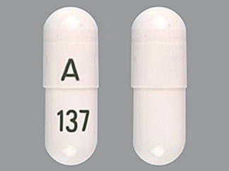 Esto es un Cápsula imprimido con 137 en la parte delantera, A en la parte posterior, y es fabricado por None.