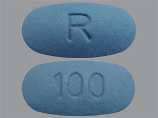 This is a Tablet imprinted with R on the front, 100 on the back.
