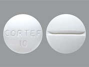 Cortef: Esto es un Tableta blanco redondo imprimido con CORTEF  10 en la parte delantera, nada en la parte posterior, y es fabricado por PHARMACIA-UPJHN.