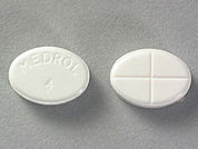 Medrol: This is a Tablet imprinted with MEDROL  4 on the front, nothing on the back.