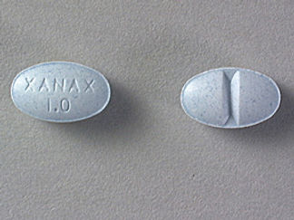 Esto es un Tableta imprimido con XANAX  1.0 en la parte delantera, nada en la parte posterior, y es fabricado por None.