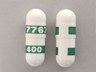This is a Capsule imprinted with 7767 on the front, 400 on the back.