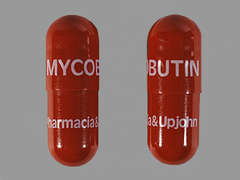 This is a red-brown oblong Capsule imprinted with MYCOBUTIN on the front, PHARMACIA & UPJOHN on the back, and is manufactured by GREENSTONE LLC..