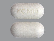 Klor-Con M: This is a Tablet Er Particles/crystals imprinted with KC M10 on the front, nothing on the back.