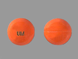 This is a Capsule imprinted with UM on the front, nothing on the back.