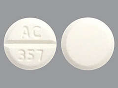This is a white round Tablet imprinted with AC  357 on the front, nothing on the back, and is manufactured by UPSHER-SMITH LA.