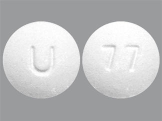 This is a Tablet Er 12 Hr imprinted with U on the front, 77 on the back.
