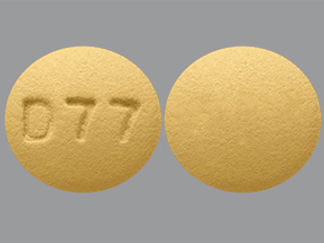 This is a Tablet imprinted with D77 on the front, nothing on the back.