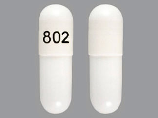 This is a Capsule imprinted with 802 on the front, nothing on the back.