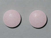 Vitamin B-12: This is a light pink round Tablet imprinted with nothing on the front, nothing on the back, and is manufactured by WALGREEN CO..