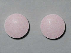 This is a light pink round Tablet imprinted with nothing on the front, nothing on the back, and is manufactured by WALGREEN CO..