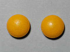 Esto es un Tableta naranja redondo imprimido con nada en la parte delantera, nada en la parte posterior, y es fabricado por WALGREEN CO..