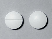 Vitamin B-6: This is a Tablet imprinted with nothing on the front, nothing on the back.