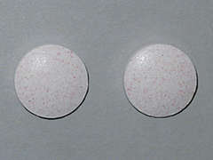 This is a pink round Tablet imprinted with nothing on the front, nothing on the back, and is manufactured by WALGREEN CO..