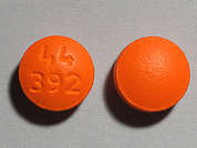 Ibuprofen: This is a orange round Tablet imprinted with 44  392 on the front, nothing on the back, and is manufactured by WALGREEN CO..