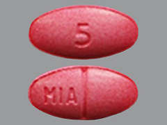 This is a pink oval Tablet imprinted with 5 on the front, MIA on the back, and is manufactured by WILSHIRE PHARMA.