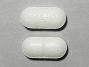 Potassium Chloride: This is a white oblong Tablet Er Particles/crystals imprinted with ABRS-123 on the front, nothing on the back, and is manufactured by SUN PHARMACEUTI.