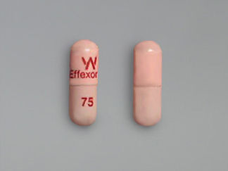 This is a Capsule Er 24 Hr imprinted with W  Effexor XR on the front, 75 on the back.