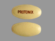 Protonix: Esto es un Tableta Dr imprimido con PROTONIX en la parte delantera, nada en la parte posterior, y es fabricado por None.