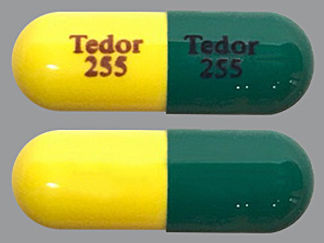 This is a Capsule imprinted with Tedor  255 on the front, Tedor  255 on the back.