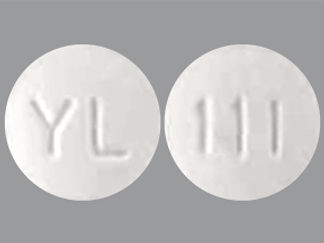 This is a Tablet imprinted with YL on the front, 111 on the back.