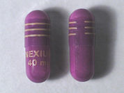 Nexium Rx: This is a Capsule Dr imprinted with NEXIUM  40mg on the front, nothing on the back.