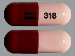Esto es un Cápsula rosado oblongo imprimido con logo en la parte delantera, 318 en la parte posterior, y es fabricado por ZYDUS PHARMACEU.