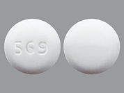 Acamprosate Calcium: This is a Tablet Dr imprinted with 569 on the front, nothing on the back.