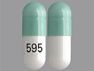 This is a Capsule Er 24 Hr imprinted with 595 on the front, nothing on the back.