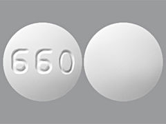 This is a Tablet imprinted with 660 on the front, nothing on the back.