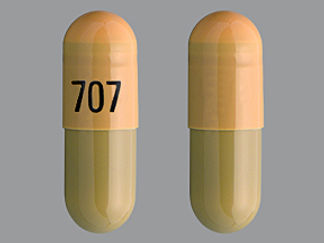 This is a Capsule imprinted with 707 on the front, nothing on the back.