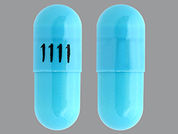 Tizanidine Hcl: This is a Capsule imprinted with 1111 on the front, nothing on the back.