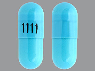 This is a Capsule imprinted with 1111 on the front, nothing on the back.