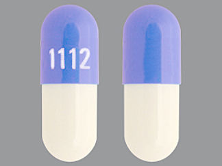 This is a Capsule imprinted with 1112 on the front, nothing on the back.