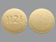 Doxycycline Monohydrate: This is a Tablet imprinted with 1121 on the front, nothing on the back.