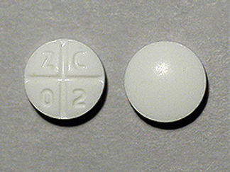 This is a Tablet imprinted with logo and 0 2 on the front, nothing on the back.