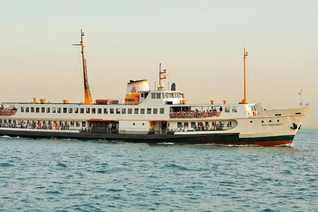 File image: Passenger ferry at sea with passengers visible on decks