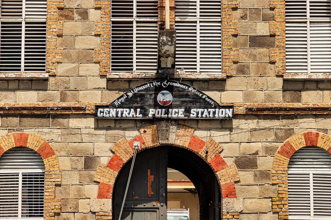 File image: Historic sandstone and brick Central Police Station building with arched entrance and institutional architecture.