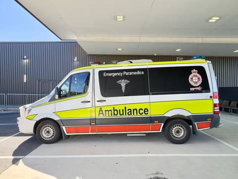 File image: White and yellow Australian Emergency Paramedics ambulance at medical facility