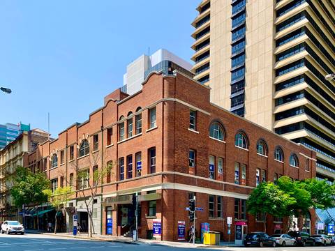 File image: Brisbane city street corner with traffic signals at a CBD intersection
