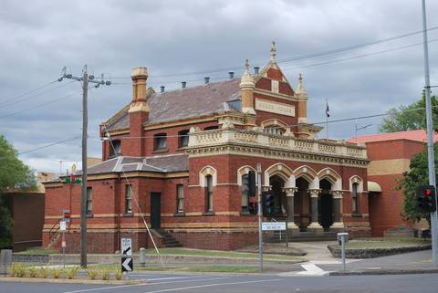 File image: Historic red brick Victorian courthouse exterior with ornate facade