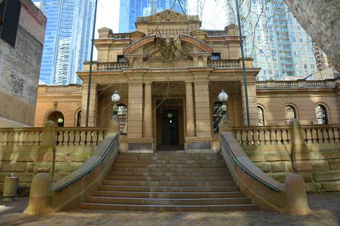 File image: Neoclassical courthouse exterior with columns, grand staircase, and formal classical architecture