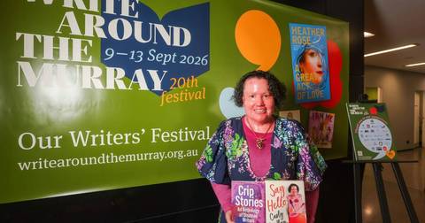 Carly Findlay. Woman holding books at Murrayrang Writers' Festival event, September 2026